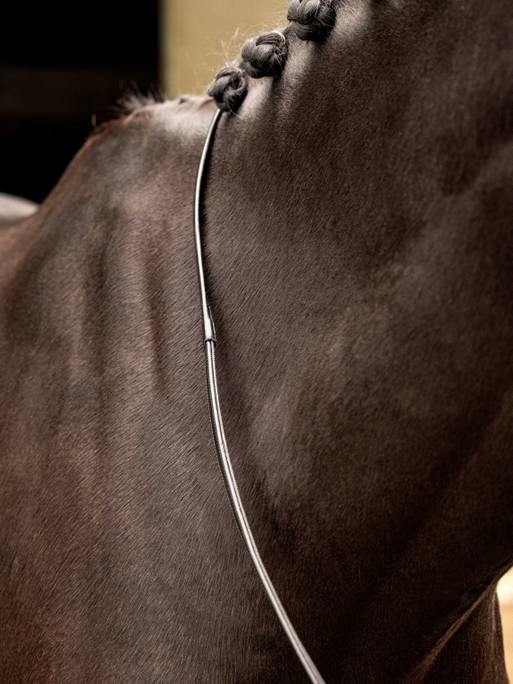 With a half-leather, half-rubber construction, our Rubber Half-Lined Reins are light in the hands and provide exceptional grip for all riding styles. The LeMieux Rubber Half-Lined Reins are soft and flexible reins that feature a light grip feel in the 