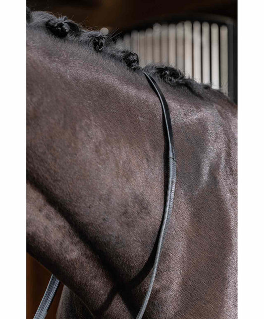 The LeMieux Soft Rubber Reins are beautifully soft and flexible reins that have a light feel in the riders’ hands. With raised pimple texture for additional grip and nylon lining to prevent stretching.
