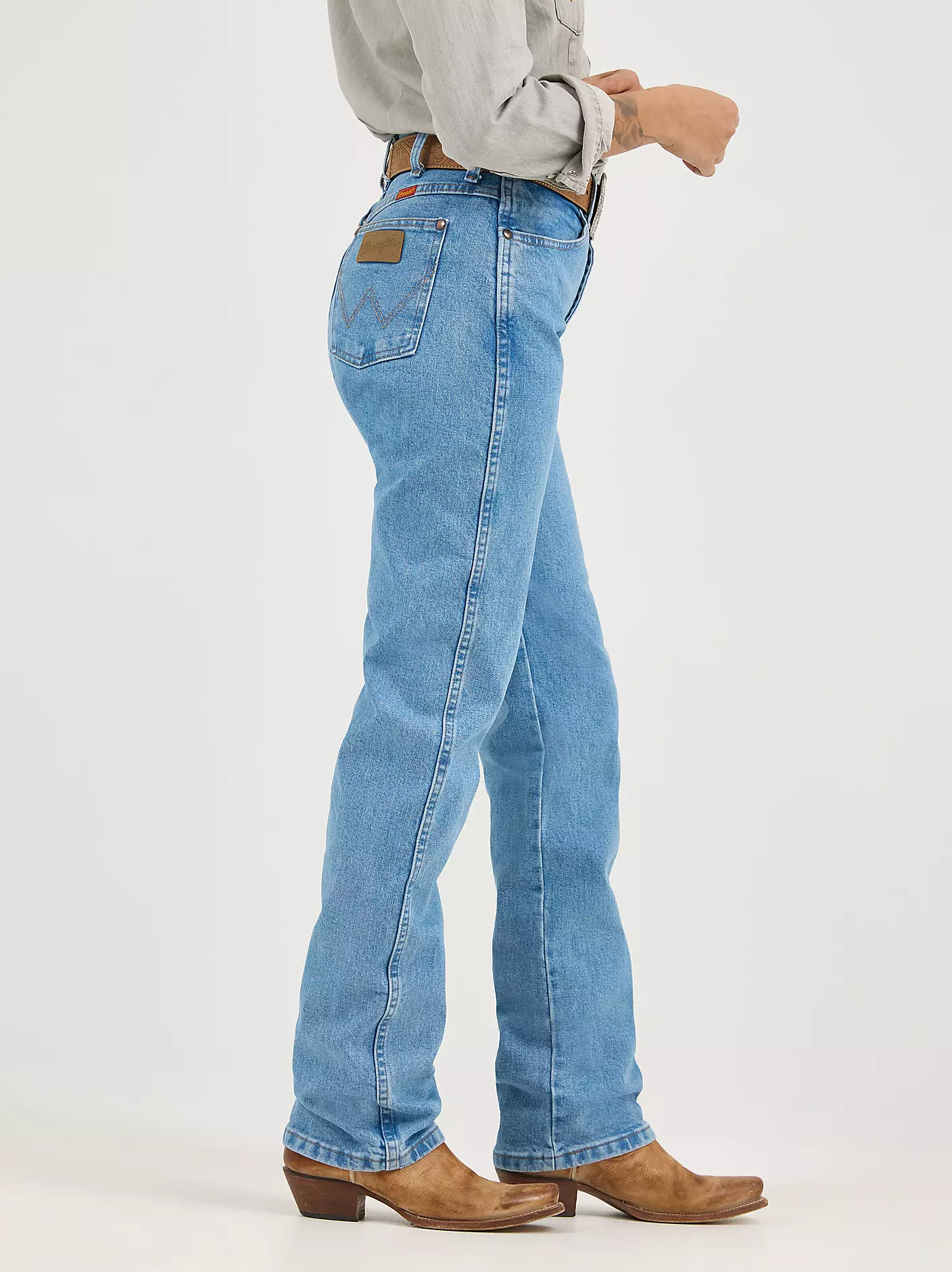 Jean Wrangler coupe cowboy slim fit - Délavage antique